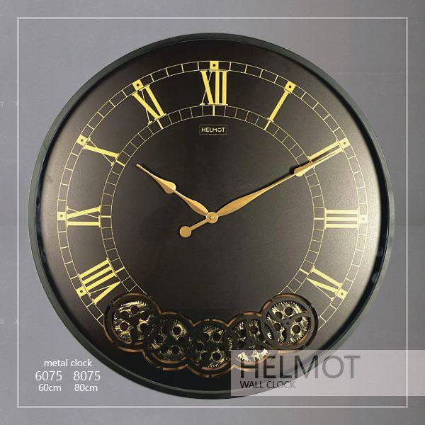  ساعت دیواری مدل هلموت، ساعت دیواری مدرن در دو سایز،متریال فلزی بدنه، دارای چرخ دنده های متحرک، ترکیب رنگ مشکی طلایی، موتور ساخت تایوان با 5 سال ضمانت، سایز 60 | کد 6075