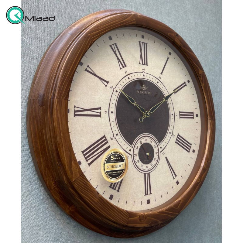 ساعت دیواری شوبرت مدل 1500، ساعت دیواری با فریم چوب طبیعی، سایز 50 با اعداد و عقربه های قهوه ای ساعت دیواری فلزی