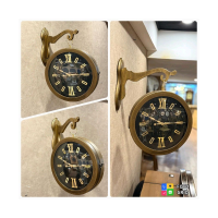ساعت دیواری دو طرفه مدل 1950، ساعت دو طرفه بسیار بینظیر، متریال چوبی با تنوع رنگی، موتور درجه یک روانگرد، رنگ طلایی  ساعت برند ارس