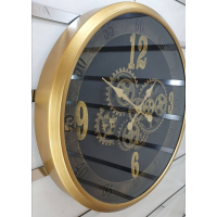 ساعت دیواری اویسا مدل 410، ساعت دیواری ساخته شده با بدنه پلاستیک، دارای چرخ دنده متحرک روی صفحه ساعت، اعداد لاتین، سایز 60، رنگ طلایی