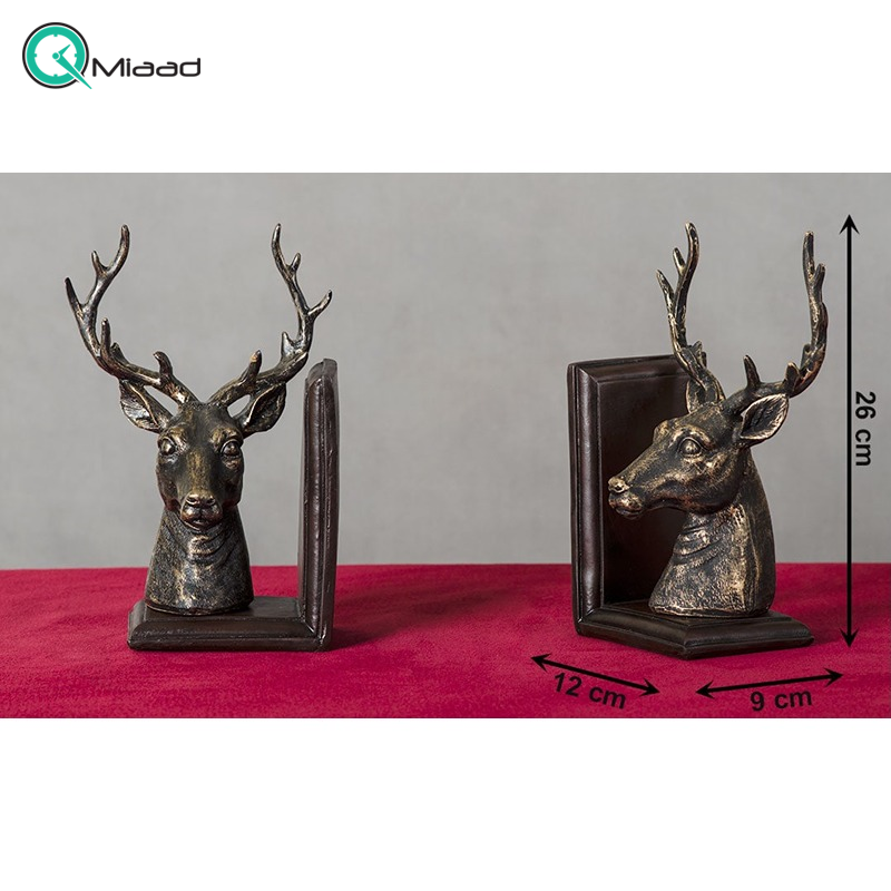 هولدر کتاب طرح گوزن مدل MO16118، مجسمه دکوری و زیبا با کارایی هولدر کتاب، زیبا کننده هر میز و هر سطحی، هدیه ای مناسب برای خانم ها و حتی آقایان کتابخوان، رنگ مشکی طلایی  دکوراسیون
