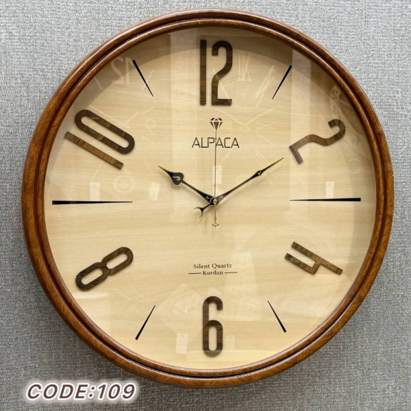  ساعت دیواری چوبی آلپاکا Alpaca کد 109، ساعت دیواری طرح راش گرد قهوه‌ای سایز 60 و موتور آرامگرد، ترکیبی از زیبایی چوب و طراحی مدرن