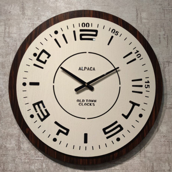 ساعت دیواری آلپاکا مدل SO10، ساعت دیواری سایز 60 با طراحی ساده و مینیمال، رنگ قهوه ای سفید، متریال MDF ساعت، صفحه با شیشه آینه ای، دارای موتور آرامگرد و دو سال ضمانت