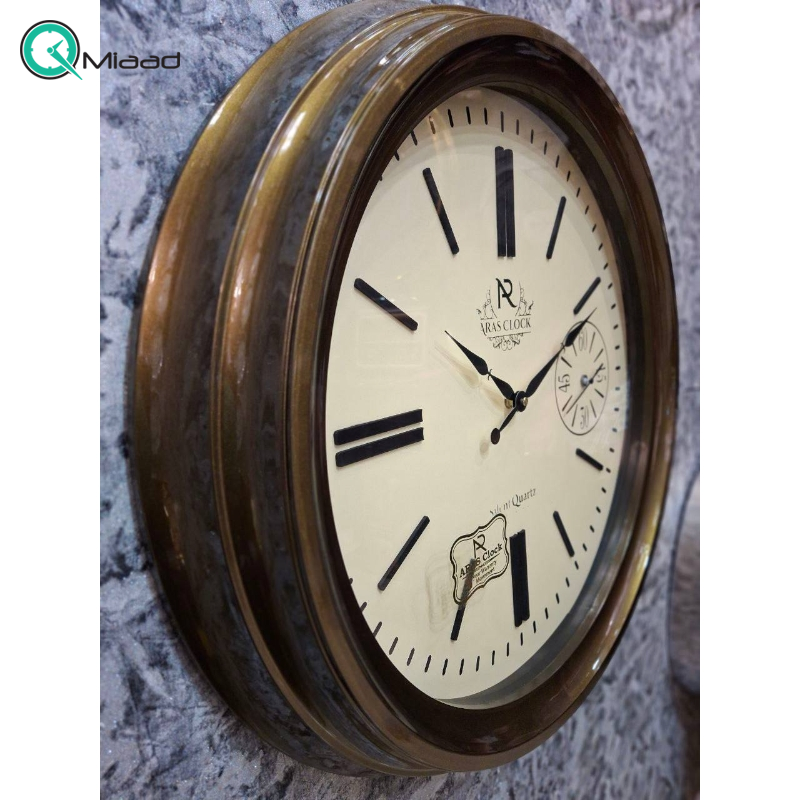ساعت دیواری ارس مدل 931، ساعت دیواری با متریال پلاستیک ABS و صفحه تمام چوب، دارای اعداد رومی، موتور درجه یک تایوانی ساعت و موتور آرامگرد، رنگ قهوه ای  ساعت دیواری فلزی