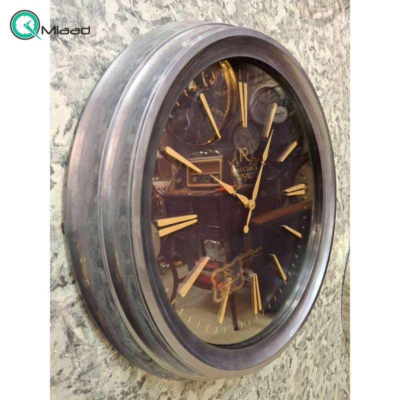 ساعت دیواری ارس مدل 932، ساعت دیواری با متریال پلاستیک ABS و صفحه تمام چوب، دارای اعداد رومی، موتور درجه یک تایوانی ساعت، رنگ طوسی  ساعت دیواری فلزی