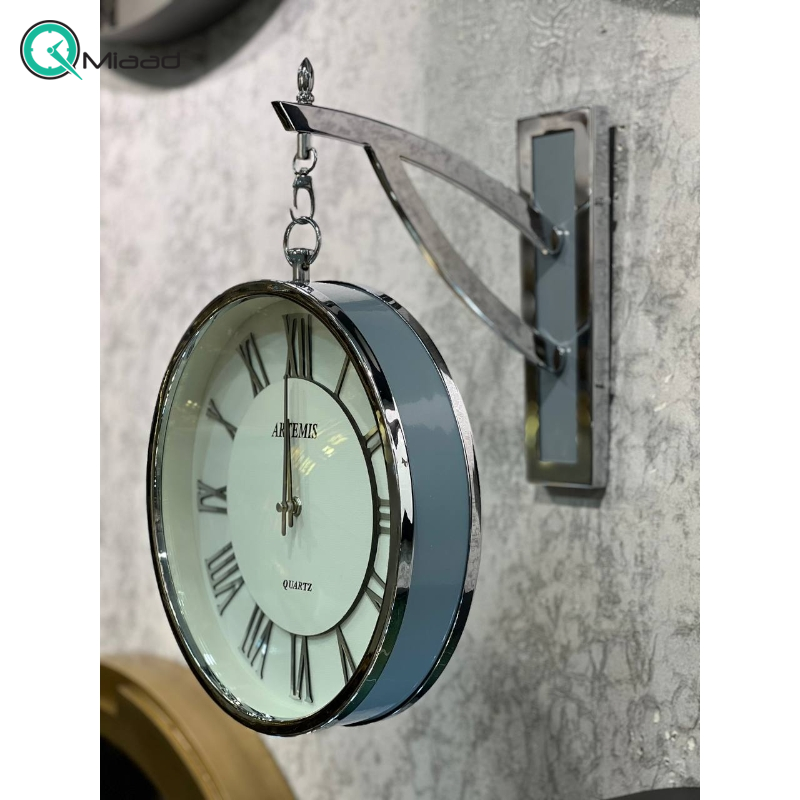 ساعت دیواری یک طرفه آرتمیس مدل 30280، ساعت مدل طرفه آویز بسیار بینظیر با متریال فلز، موتور درجه یک روانگرد، رنگ سیلور  ساعت دیواری دو طرفه