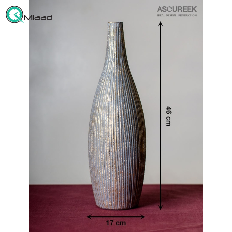 گلدان مدل سنگی کد GO27242، گلدان تزیینی و دکوری با طراحی ساده و زیبا و همینطور خلاقانه، طرح سنگی، رنگ طوسی طلایی  خرید گلدان