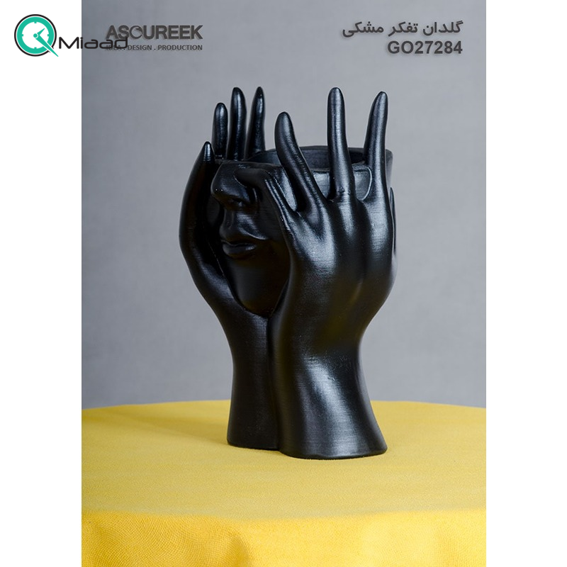 گلدان تفکر مدل GO27284، گلدان تزیینی و دکوری با طراحی ساده و زیبا و همینطور خلاقانه، طرح صورت و دست و نماد تفکر، رنگ مشکی  محصولات آسوریک