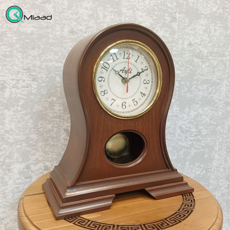 ساعت رومیزی چوبی آیلی مدل 444B، ساعت رومیزی پاندول دار با متریال تمام چوب، طراحی فانتزی و مینیمال، موتور آرامگرد و 2 سال ضمانت، اعداد لاتین قیمت ساعت رومیزی
