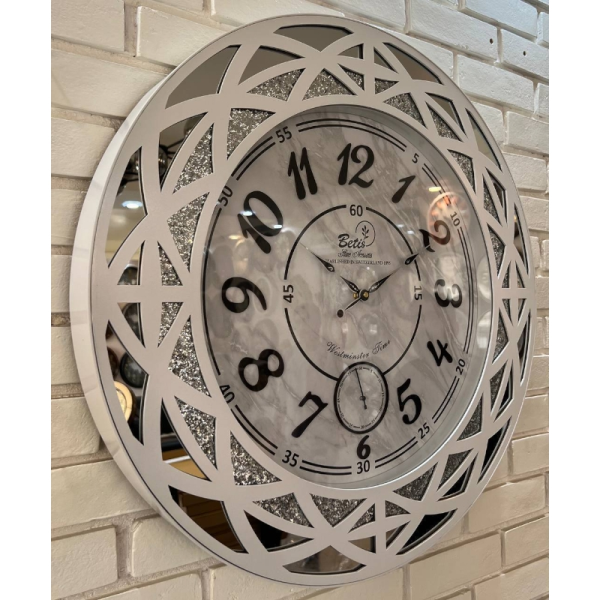 ساعت دیواری بتیس مدل 6708، ساعت دیواری با متریال چوب و فلز، طراحی آینه ای، دارای موتور آرامگرد، عدد لاتین، رنگ سفید صدفی