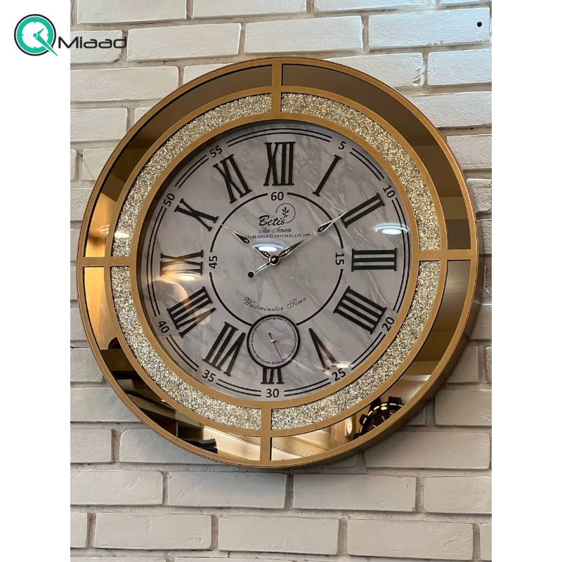 ساعت دیواری بتیس مدل 6709، ساعت دیواری با متریال چوب و آینه، دو موتوره و دارای موتور ثانیه شمار مستقل، رنگ طلایی قیمت ساعت دیواری