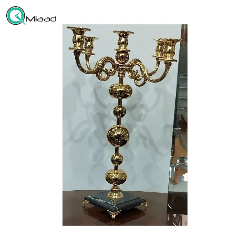 مجسمه و شمعدان فلزی کد 6410، شمعدان 5 شعله با متریال فلز و طراحی بی نظیر، رنگ طلایی مجسمه