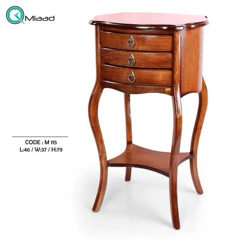 میز تلفن چوبی مدل M 115، میز تلفن پایه دار بسیار شیک و چوبی، دارای سه کشو برای نگه داری وسایل کوچک، فضایی برای نگه درای وسایل تزیینی در قسمت پایین و بالای میز خرید میز تلفن گرام