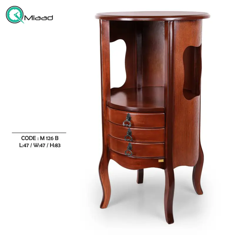 میز تلفن چوبی مدل M 126 فندقی، میز تلفن پایه دار بسیار شیک و چوبی، دارای سه کشو برای نگه داری وسایل کوچک، فضایی برای نگه درای وسایل تزیینی در قسمت پایین و بالای میز خرید میز تلفن گرام