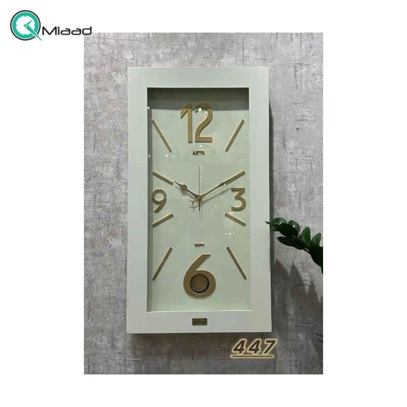 ساعت دیواری آرتا Arta کد 447، ساعت دیواری چهارگوش چوبی با متریال MDF، دارای پاندول و اعداد لاتین، دارای موتور آرامگرد، رنگ سفید ساعت