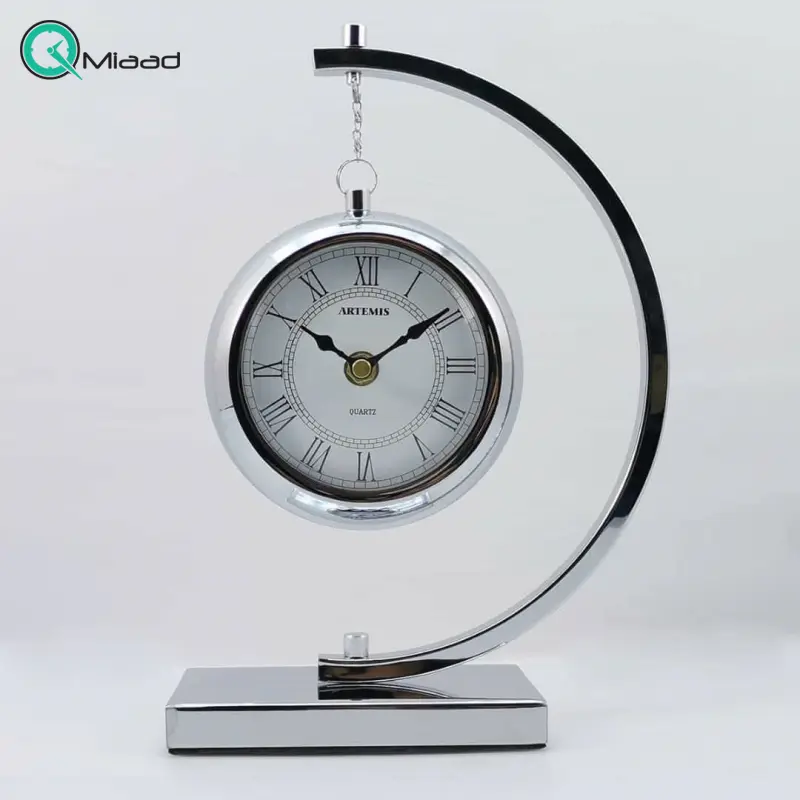 ساعت رومیزی فلزی آرتمیس مدل 30260 نقره ای، ساعت رومیزی بسیار زیبا و مدرن آرتمیس، دکوری و بسیار زیبا، در رنگ طلایی و نقره ای، اعداد رومی ساعت رومیزی