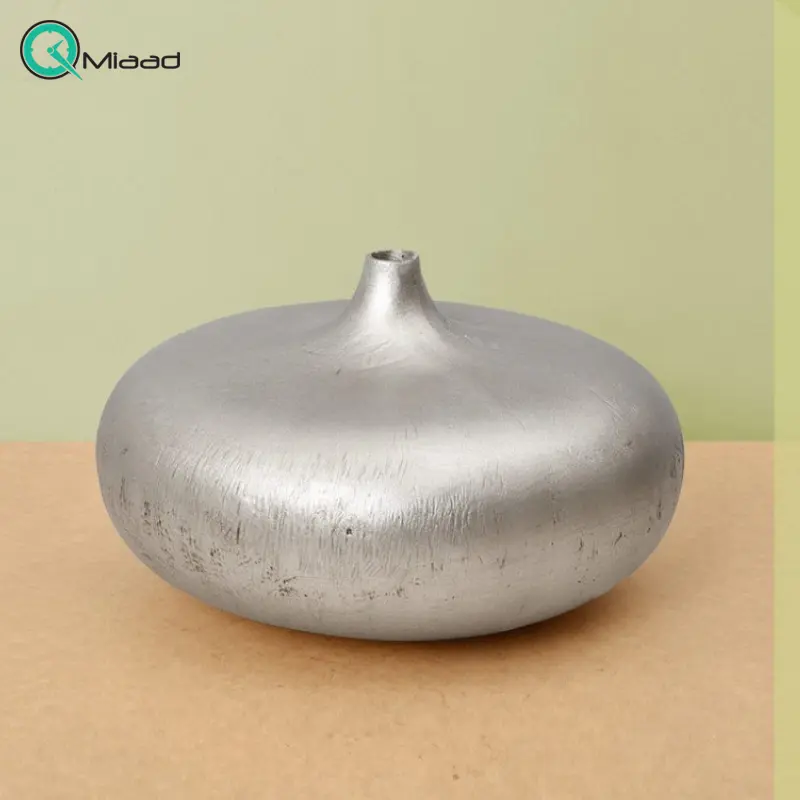 گلدان عدسی کوچک GO27067، گلدان تزیینی و دکوری با طراحی ساده و زیبا، رنگ نقره ای گلدان