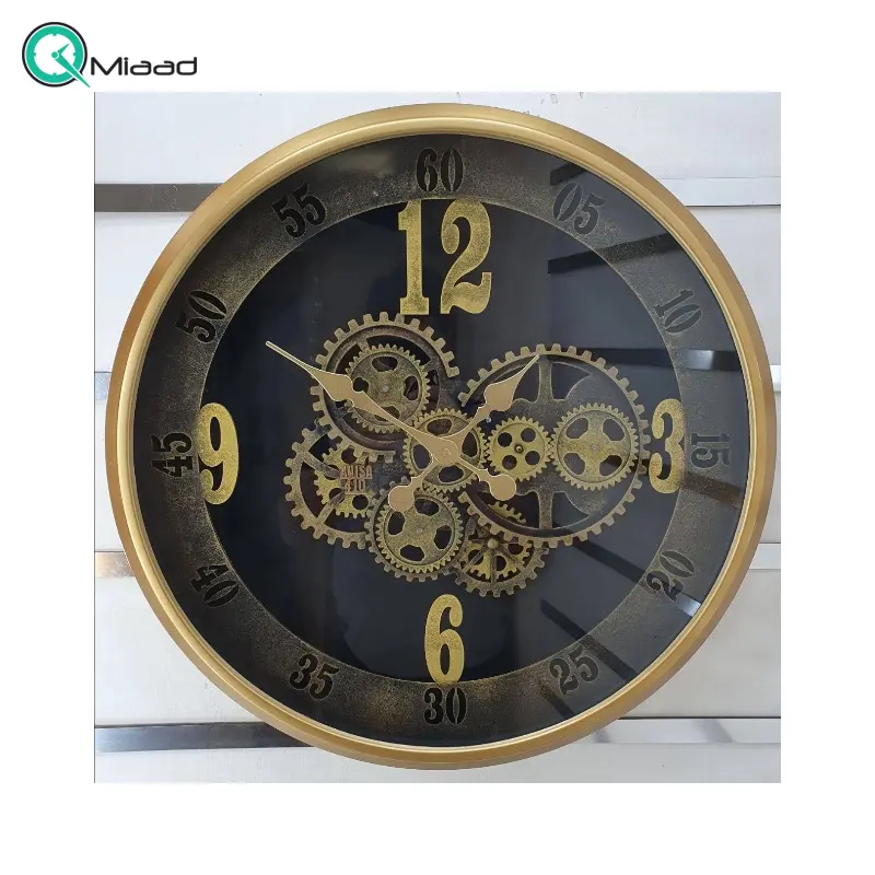 ساعت دیواری اویسا مدل 410، ساعت دیواری ساخته شده با بدنه پلاستیک، دارای چرخ دنده متحرک روی صفحه ساعت، اعداد لاتین، سایز 60، رنگ طلایی ساعت دیواری