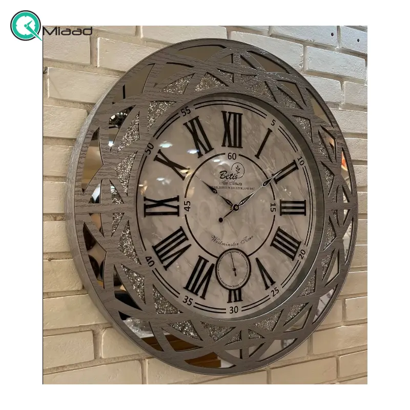 ساعت دیواری بتیس مدل 6708، ساعت دیواری با متریال چوب و فلز، طراحی آینه ای، دارای موتور آرامگرد، عدد یونانی، رنگ نقره ای ساعت دیواری