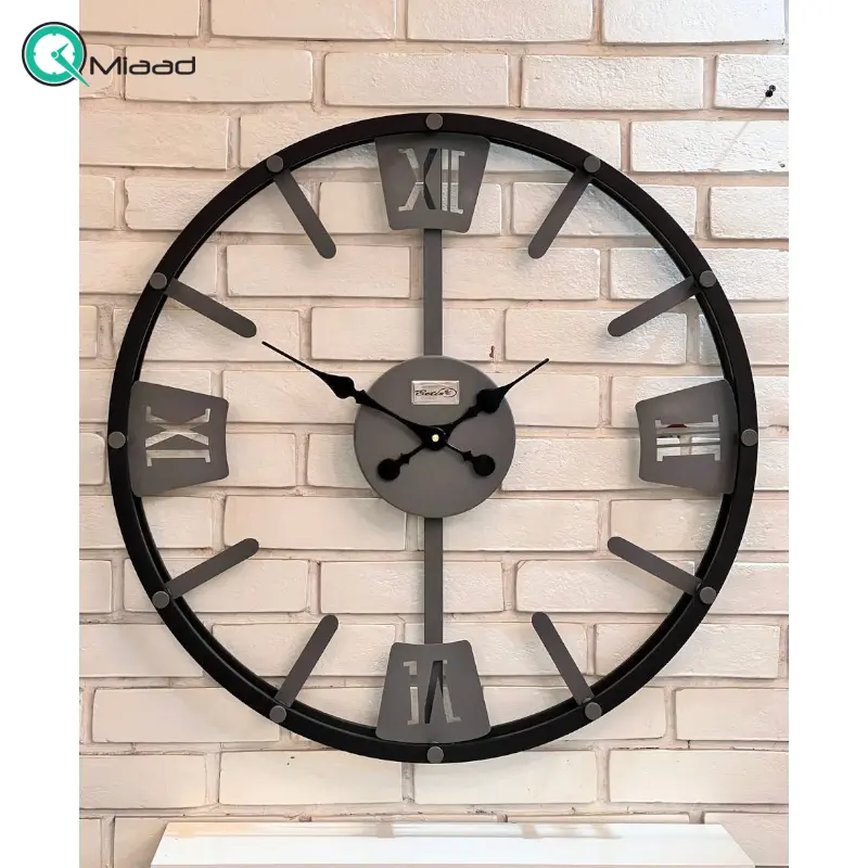 ساعت دیواری بتیس مدل 6717، ساعت دیواری بسیار مدرن با متریال فلز، موتور تایوانی، اعداد لاتین، سایز 68، رنگ مشکی طوسی ساعت دیواری