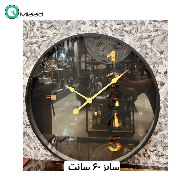 ساعت دیواری هلموت کد 6079، ساعت دیواری مدرن عدد خطی با طراحی مینیمال با زه فلزی رنگ استاتیک، سایز 60 سانتی متر، موتور میتسو با 5 سال ضمانت هلموت ساعت