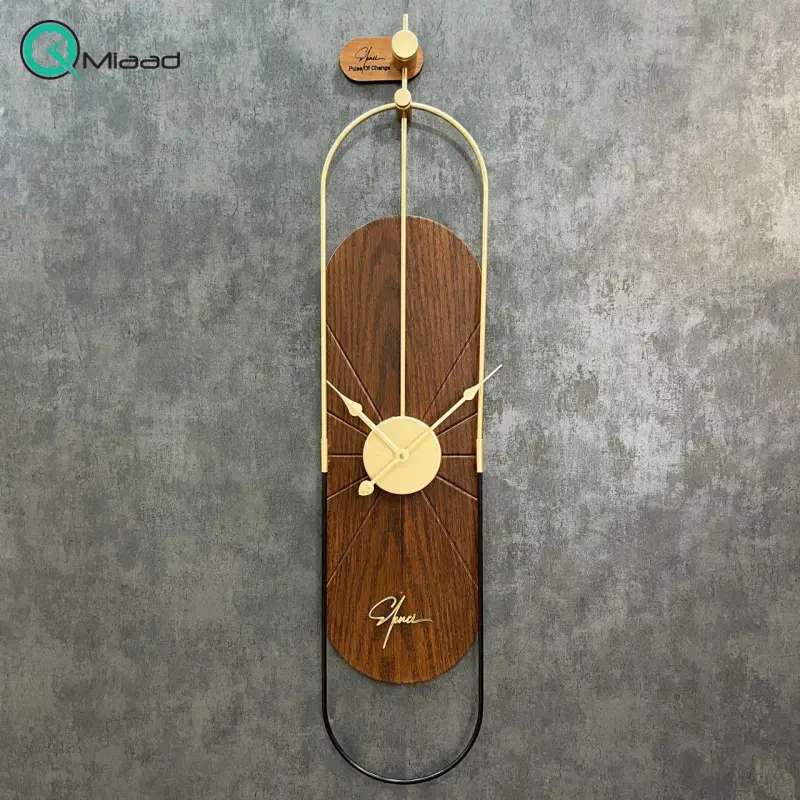 ساعت دیواری مدرن کوین Sf_009، ساعت دیواری با متریال ام دی اف و استیل، دارای رنگ بندی، رنگ قهوه ای، دارای موتور آرامگرد و دو سال ضمانت ساعت دیواری