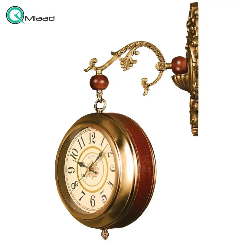 ساعت دیواری دو طرفه لوتوس، ساعت دیواری شیک از جنس فلز آبکاری و چرم، دارای دو موتور آرامگرد تایوانی | مدل 8700 ساعت