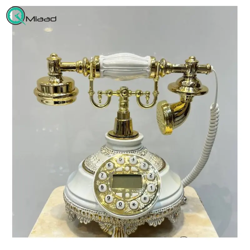 تلفن رومیزی سلطنتی میرون مدل 145، تلفن رومیزی سلطنتی دارای شناسه تماس گیرنده و شماره گیر دکمه ای، رنگ سفید طلایی تلفن قدیمی دکوری