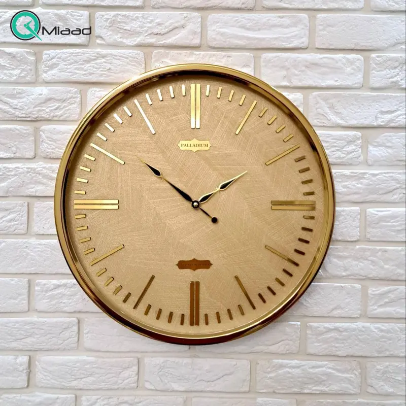ساعت دیواری فلزی پالادیوم مدل x200، ساعت دیواری سایز 55 با فونت جذاب و خوانا اعداد لاتین، ساعت دیواری شیک و متفاوت آبکاری شده با فریم فلزی، رنگ طلایی ساعت دیواری