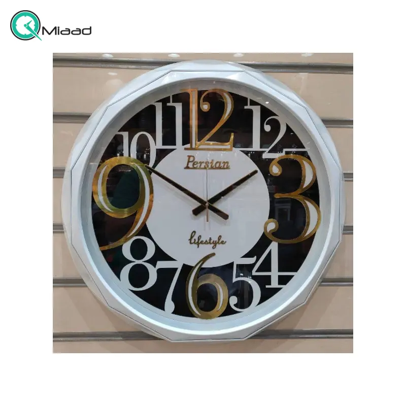 ساعت دیواری پرشین مدل 704-2، ساعت دیواری با تنوع رنگی، صفحه چوب و کاغذ دیواری برجسته، دارای موتور روانگرد و اعداد برجسته آبکاری شده لاتین، سایز 60، رنگ سفید ساعت سیکو
