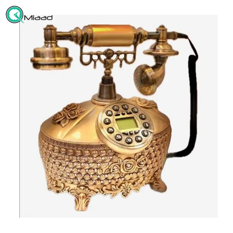 تلفن سلطنتی رومیزی رایکا مدل 340، تلفن سلطنتی با طراحی طرح نقش برجسته روی بدنه تلفن، شماره گیر دکمه ای و دارای کالر آیدی، دکوری شیک و جذاب مناسب منزل و محل کار| رنگ طلایی تلفن رومیزی