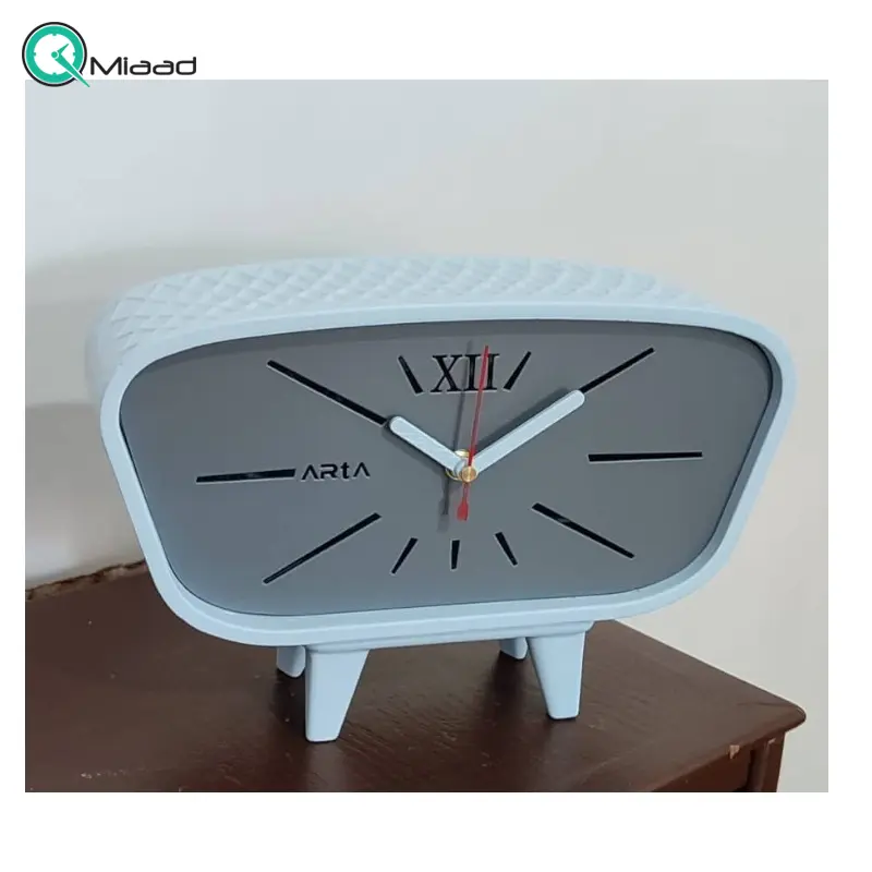 ساعت رومیزی بِتُنی مستطیل مدل 1060، ساعت رومیزی اسپرت مستطیل با متریال بتن، دارای رنگ بندی ویژه، طراحی فانتزی و مینیمال، موتور آرامگرد و 2 سال ضمانت، رنگ سفید خاکستری ساعت رومیزی