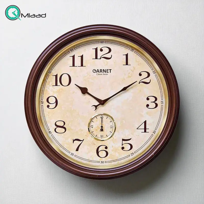 ساعت دیواری شوبرت مدل 3501، ساعت دیواری با فریم پلاستیک، سایز 50 با اعداد برجسته و موتور آرامگرد ساعت دیواری