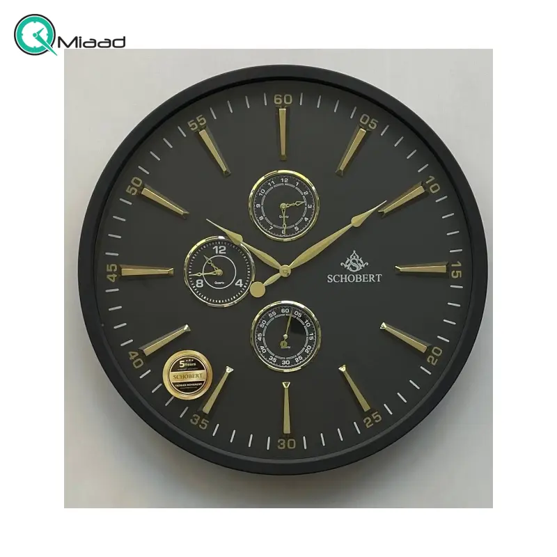 ساعت دیواری فلزی شوبرت مدل 5310، ساعت دیواری مدرن و فلزی با طراحی عالی، دارای چهار موتور فعال ، دارای موتور نمایش گرافیکی روز و شب، رنگ مشکی طلایی ساعت دیواری