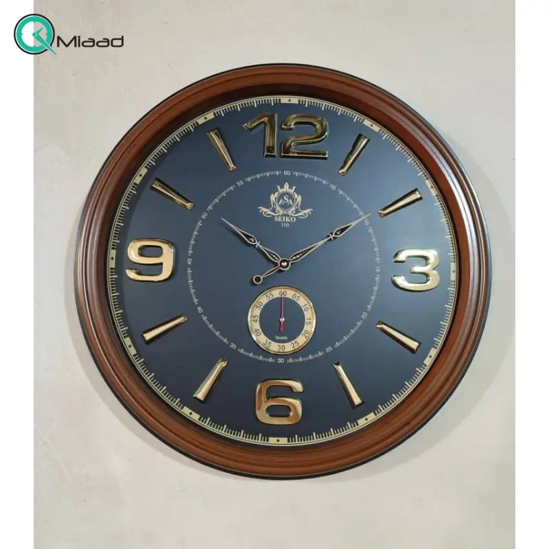ساعت دیواری سیکو مدل AS110، ساعت دیواری دو زمانه با تنوع رنگی، دارای موتور روانگرد و اعداد برجسته آبکاری شده لاتین، سایز 65، رنگ قهوه ای مشکی ساعت سیکو