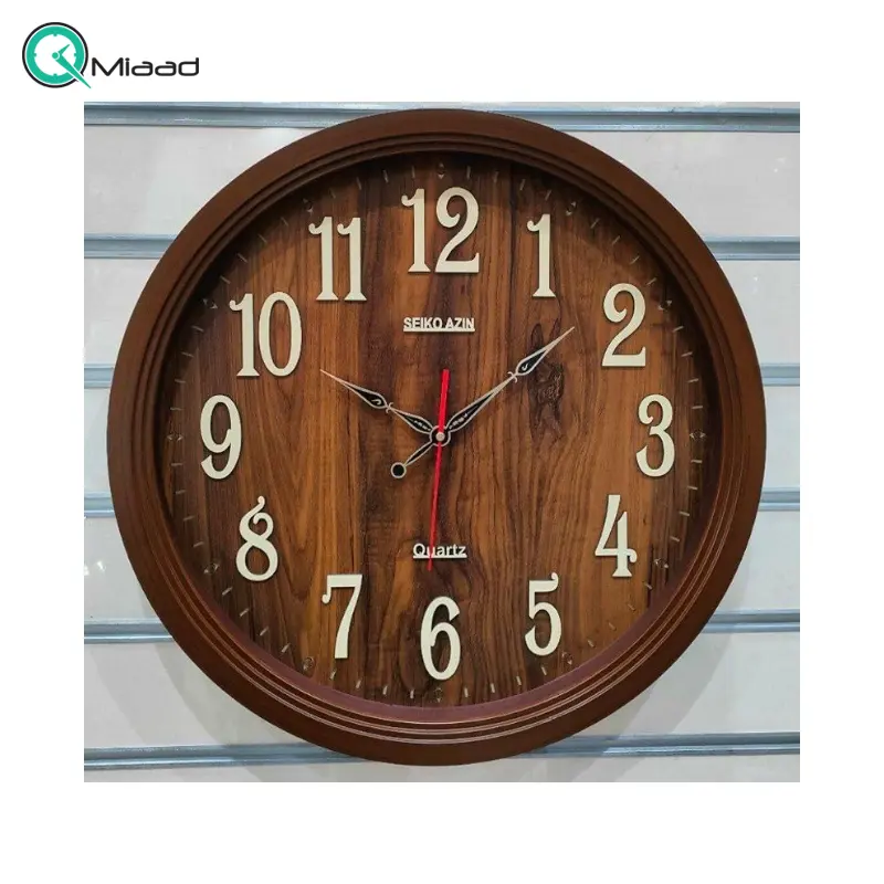 ساعت دیواری سیکو آذین مدل 110، ساعت دیواری شماره مولتی، دارای موتور روانگرد و اعداد برجسته آبکاری شده لاتین و تنوع رنگی، سایز 55، رنگ قهوه ای ساعت سیکو