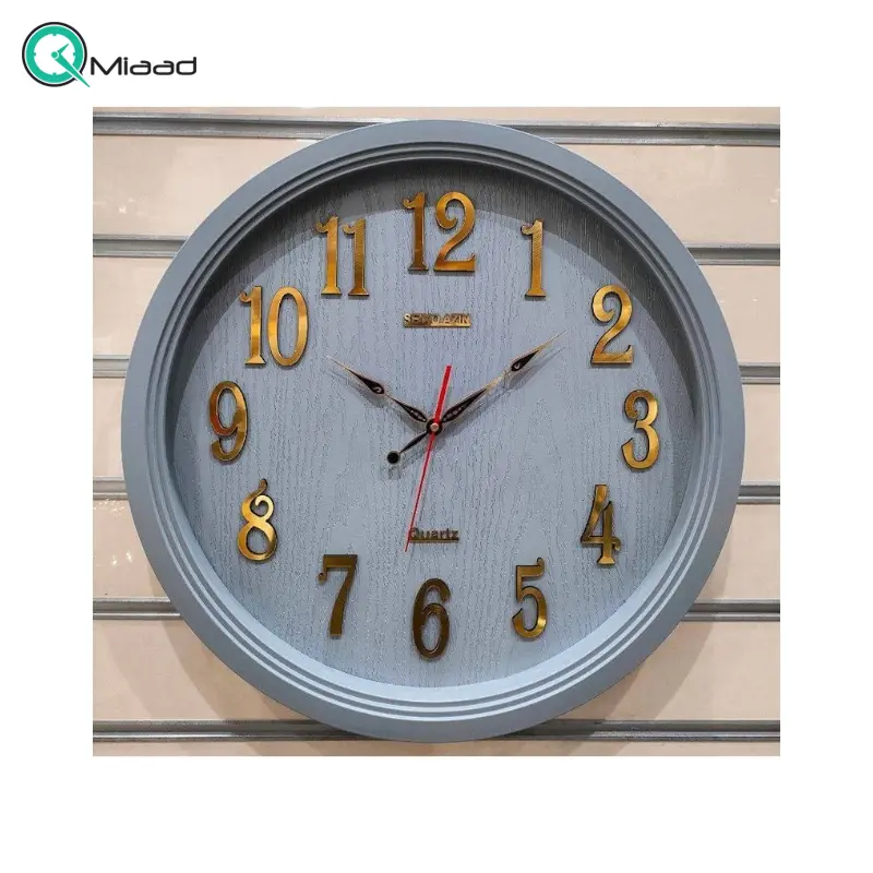 ساعت دیواری سیکو آذین مدل 110، ساعت دیواری شماره مولتی، دارای موتور روانگرد و اعداد برجسته آبکاری شده لاتین و تنوع رنگی، سایز 55، رنگ طوسی طلایی ساعت سیکو