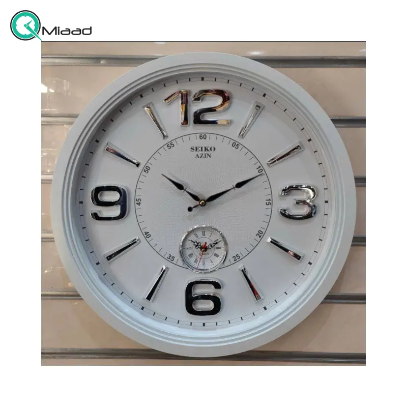 ساعت دیواری سیکو آذین مدل 120، ساعت دیواری سایز 55 پلاستیکی طرح کلاسیک با صفحه چوبی و اعداد برجسته مولتی، دارای موتور ثانیه شمار مستقل، رنگ سفید نقره ای ساعت دیواری بزرگ