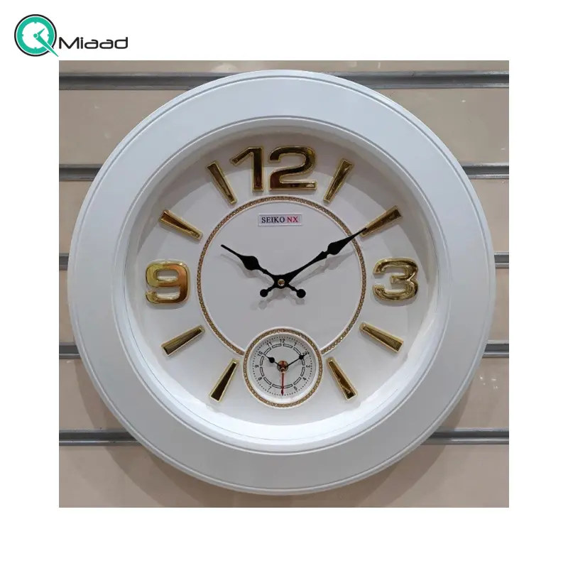 ساعت دیواری سیکو مدل NX، ساعت دیواری دو زمانه با تنوع رنگی، دارای موتور روانگرد و اعداد برجسته آبکاری شده لاتین، سایز 50، رنگ سفید طلایی ساعت سیکو