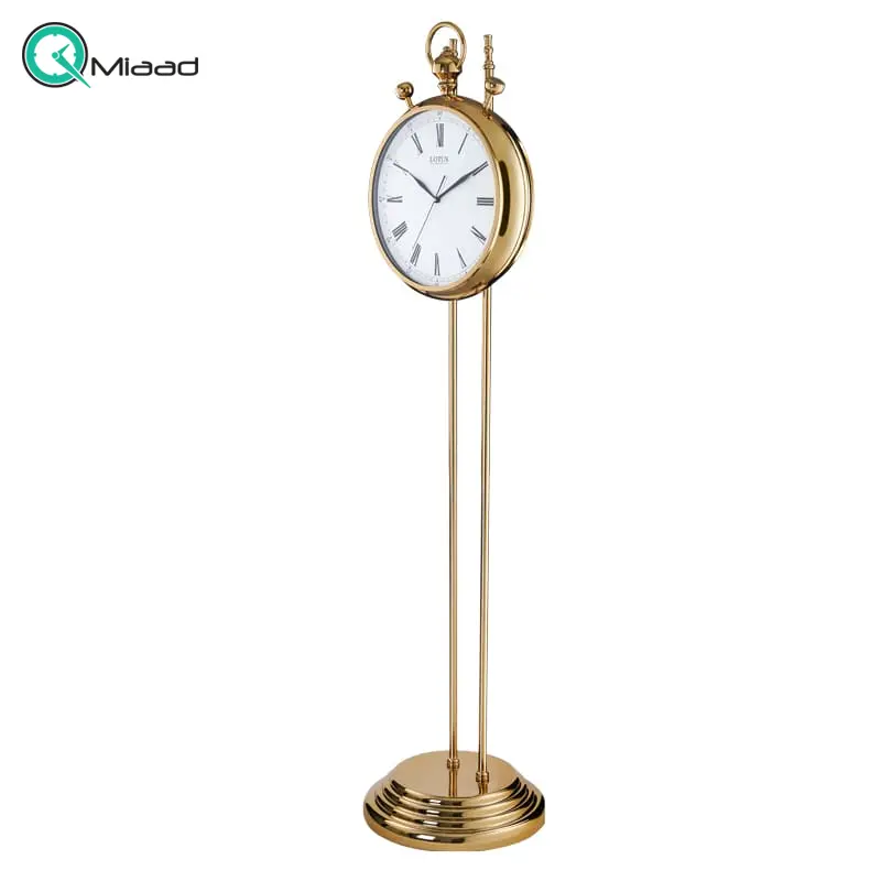 ساعت ایستاده لوتوس، ساعت ایستاده مدرن و مینیمال با طراحی جذاب، فریم از فلز آبکاری شده درجه یک، رنگ طلایی، موتور آرامگرد تایوانی، صفحه سفید رنگ | مدل MFC-9128 ساعت ایستاده