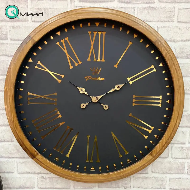 ساعت دیواری پاشا، ساعت دیواری با بدنه چوب طبیعی نراد روسی، موتور میتسو آرامگرد، اعداد رومی، ترکیب رنگ طلایی مشکی، سایز 75 مدل pasha 756 ساعت دیواری