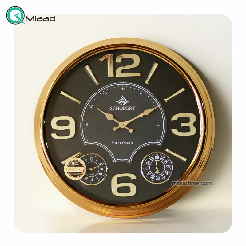 ساعت دیواری فلزی شوبرت مدل 5320 GN، ساعت دیواری سایز 50 با اعداد لاتین درشت وبرجسته ساعت دیواری مدرن و شیک