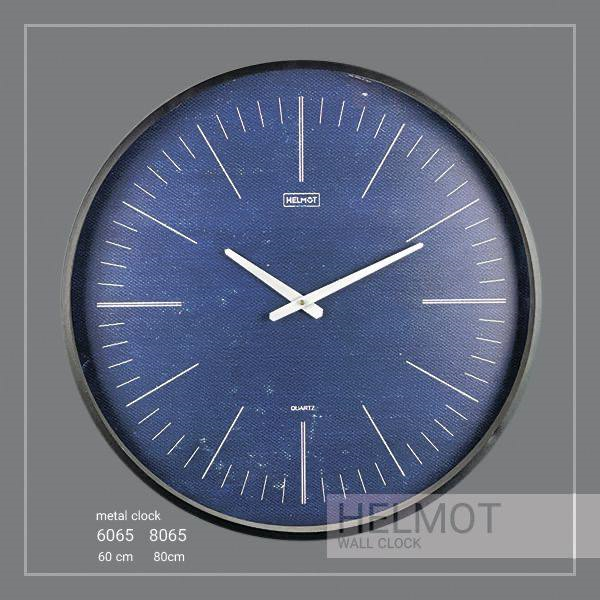  ساعت دیواری مدل هلموت، ساعت دیواری مدرن در دو سایز،متریال فلزی بدنه، چاپ مستقیم روی چوب، ترکیب رنگ آبی و مشکی، موتور ساخت تایوان با 5 سال ضمانت، سایز 60 | کد 6065