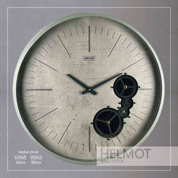  ساعت دیواری مدل هلموت، ساعت دیواری مدرن در دو سایز، متریال فلزی بدنه، چاپ مستقیم روی چوب، چرخ دنده های متحرک، موتور ساخت تایوان با 5 سال ضمانت، سایز 60| کد 6068