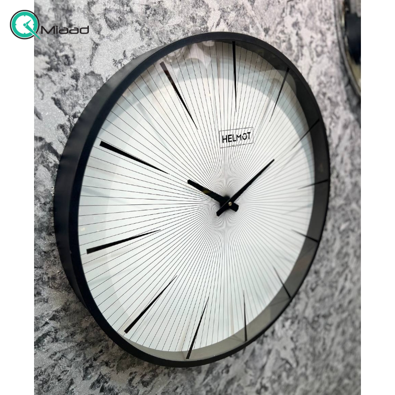 ساعت دیواری هلموت کد 6076، ساعت دیواری مدرن با طراحی مینیمال و بدنه از جنس فلز رنگ استاتیک، سایز 60 سانتی متر، موتور میتسو با 5 سال ضمانت هلموت  بدنه چوبی و فلزی