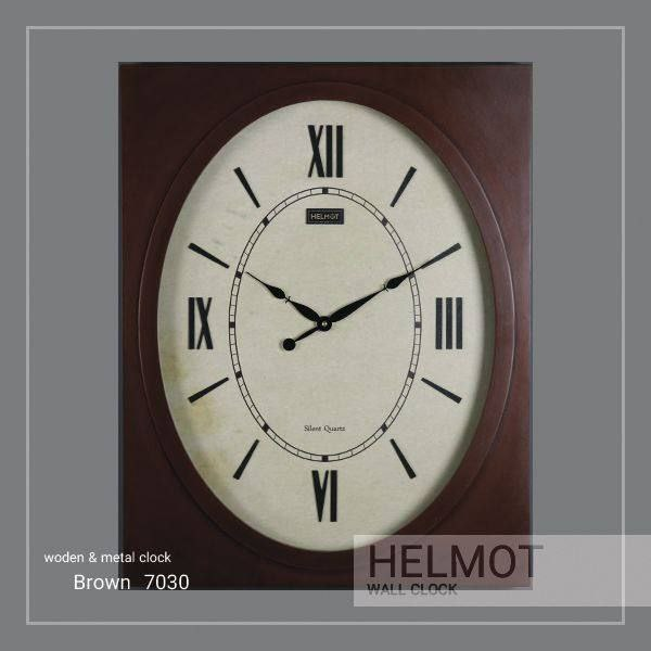 ساعت دیواری چوبی مدل هلموت کد 7030، ساعت دیواری مدرن با طراحی مینیمال، متریال چوب بدنه، اعداد برجسته استیل، موتور میتسو با 5 سال ضمانت هلموت