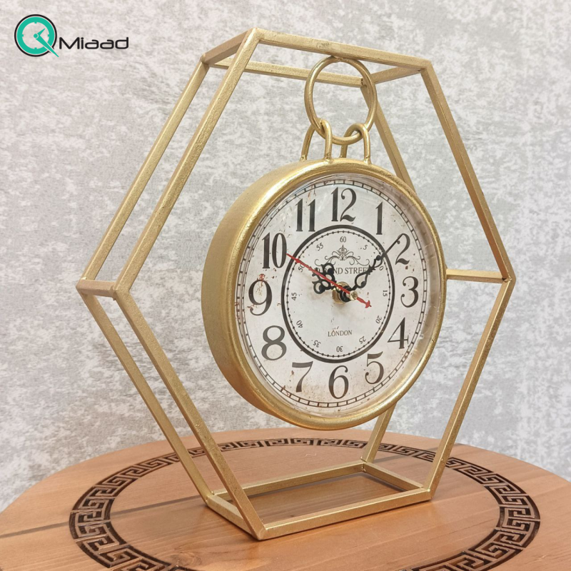 ساعت رومیزی فلزی شش ضلعی، ساعت رومیزی جدید با طراحی خلاقانه و طرح شش ضلعی، اعداد لاتین، از جنس فلز با موتور آرامگرد مناسب میز کار و میز کنسول
