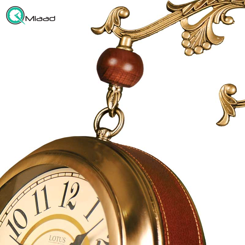 ساعت دیواری دو طرفه لوتوس، ساعت دیواری شیک از جنس فلز آبکاری و چرم، دارای دو موتور آرامگرد تایوانی | مدل 8700 برند
