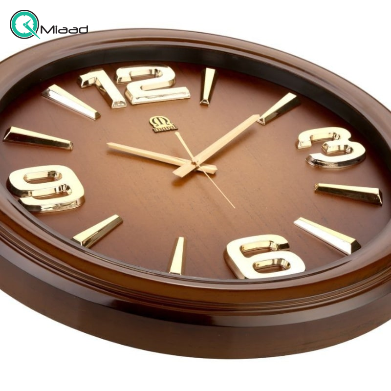 ساعت دیواری مارال، ساعت دیواری گرد کلاسیک سایز 52، موتور آرامگرد بی صدا درجه 1، موتور تایوانی، اعداد آبکاری طلایی و رنگ طرح چوب براق| کد 17 خرید ساعت دیواری شیک