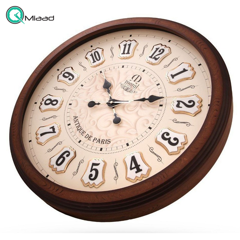 ساعت دیواری چوبی مارال مدل 604، ساعت دیواری تمام چوب با موتور میتسو تایوانی، سایز 60، ساعت دیواری با رنگ پلی یورتان ترک طرح چوب، اعداد لاتین و خلاقانه ساعت دیواری